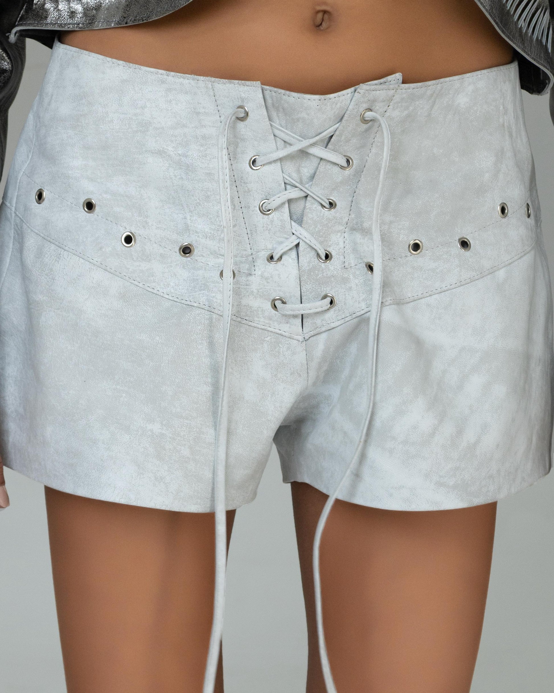 Washed white leather shorts