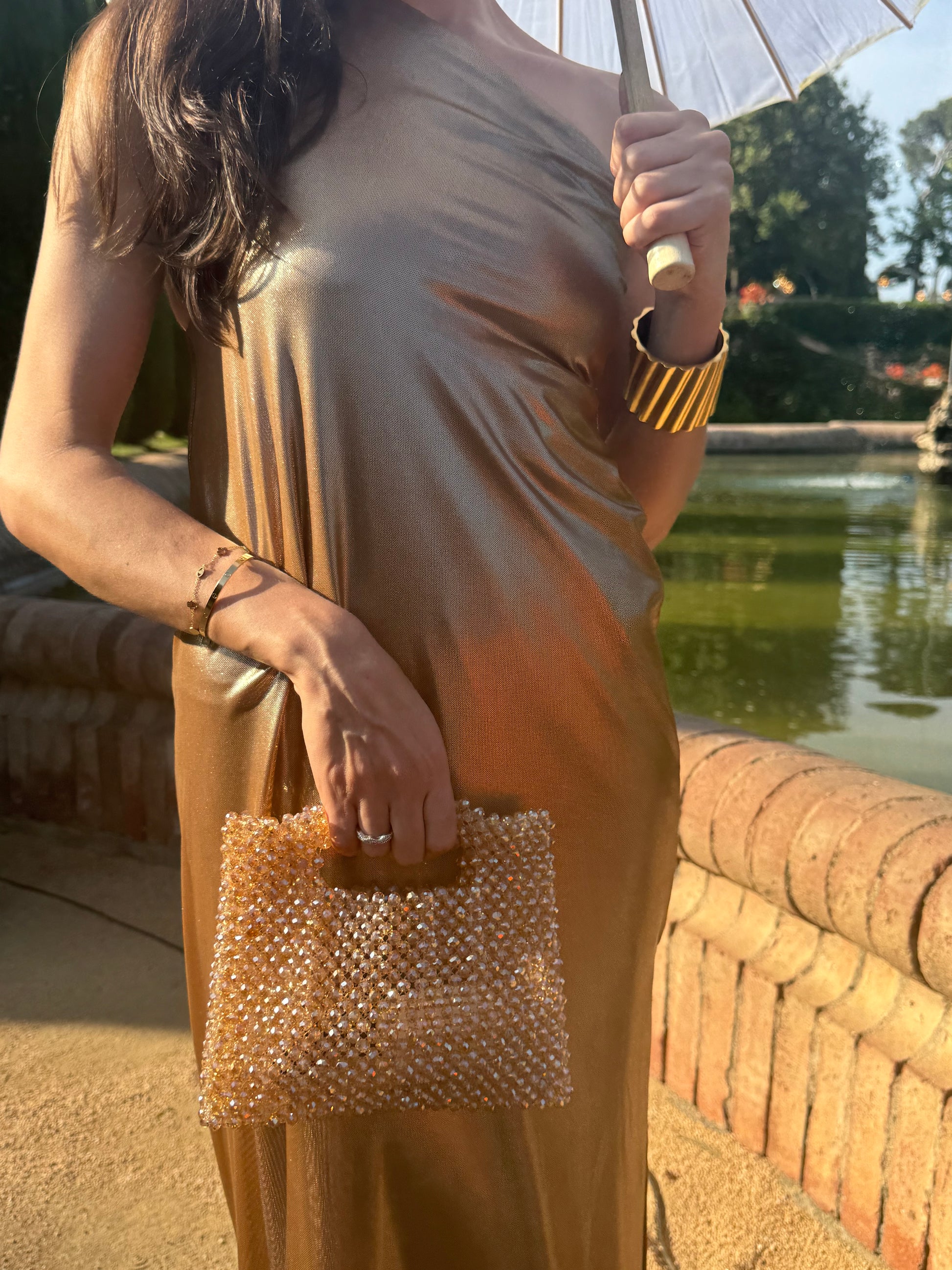 Gold beaded clutch