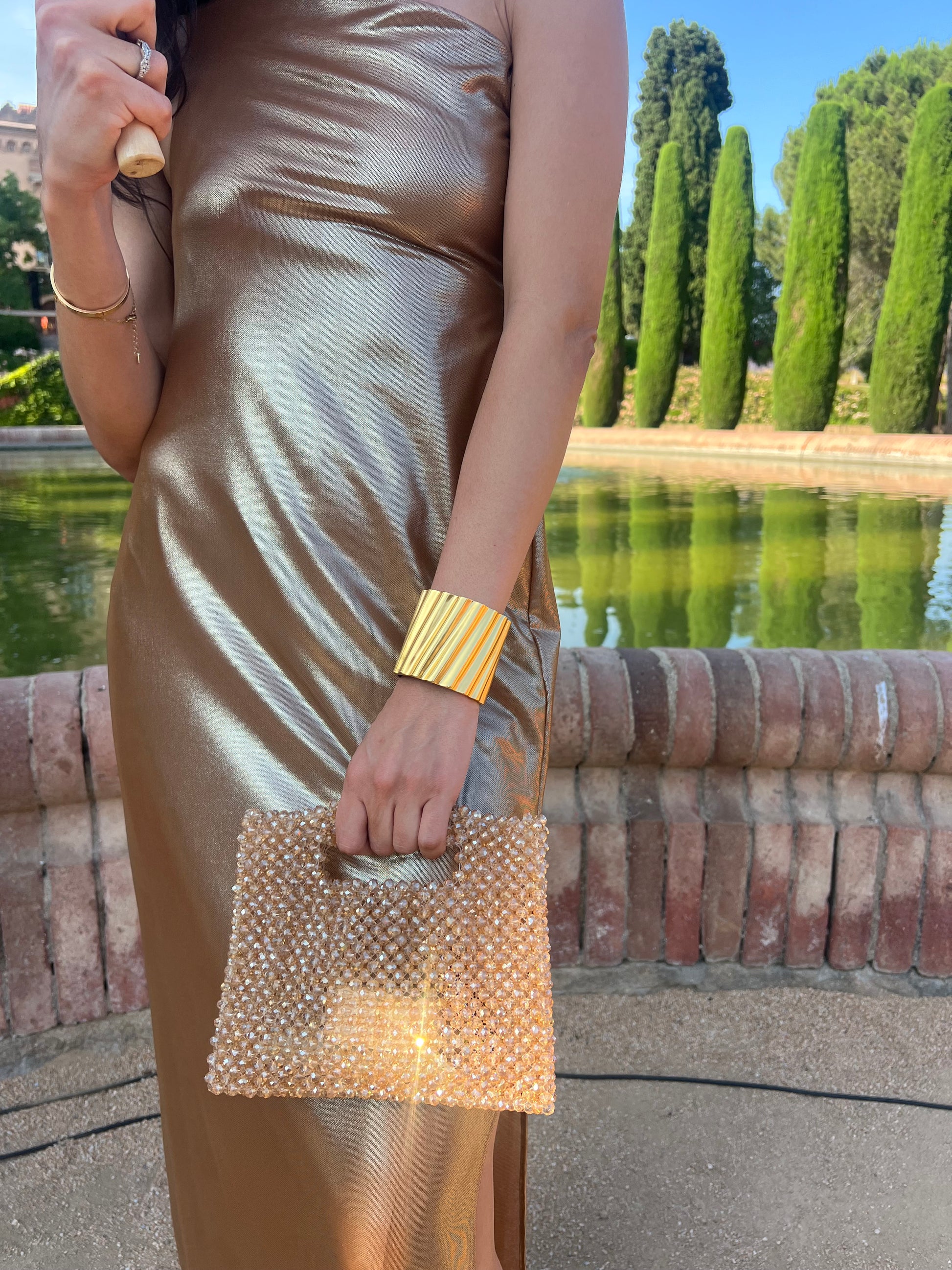 Gold beaded clutch