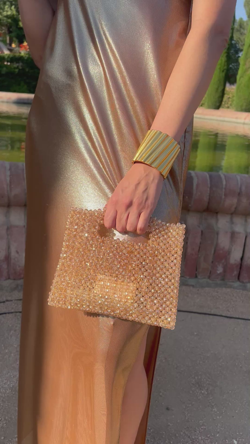 Gold beaded clutch